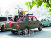 �人��ͷһ����ӭ�׳��ӡ��ڳ�������(ͼ)